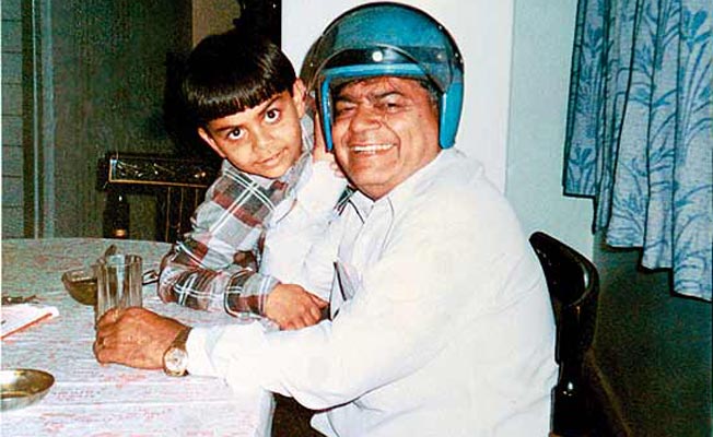 Virat Kohli with his father