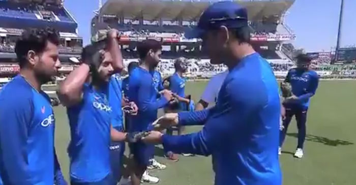 WATCH: Kedar Jadhav salutes Lt Col MS Dhoni after receiving his camouflage cap