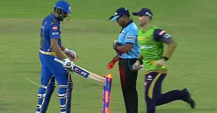 IPL 2019: MI skipper Rohit Sharma knocks bails down in anger after his LBW  dismissal against KKR