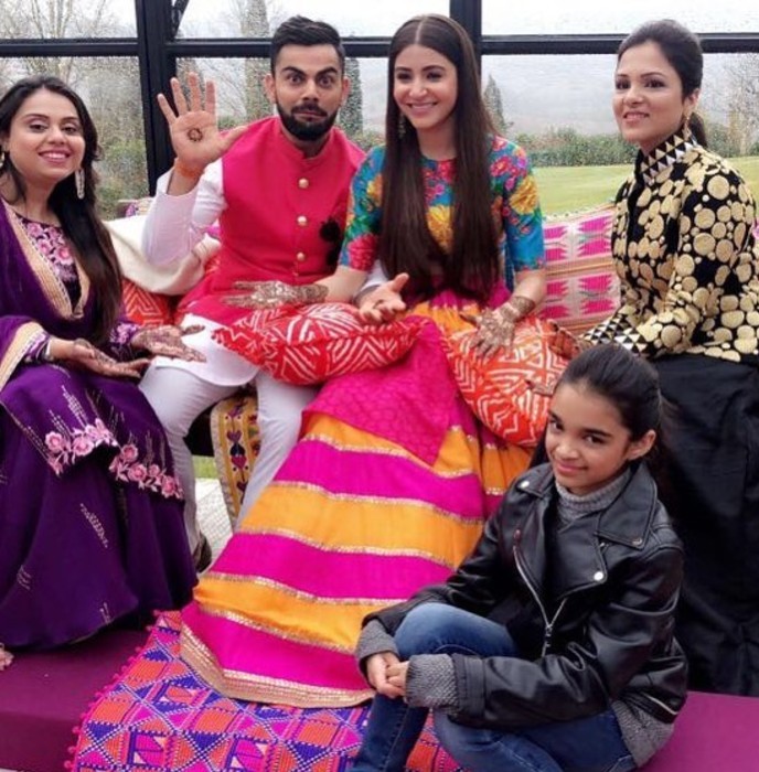 Bhawana on the left side of the frame at Virushka's wedding