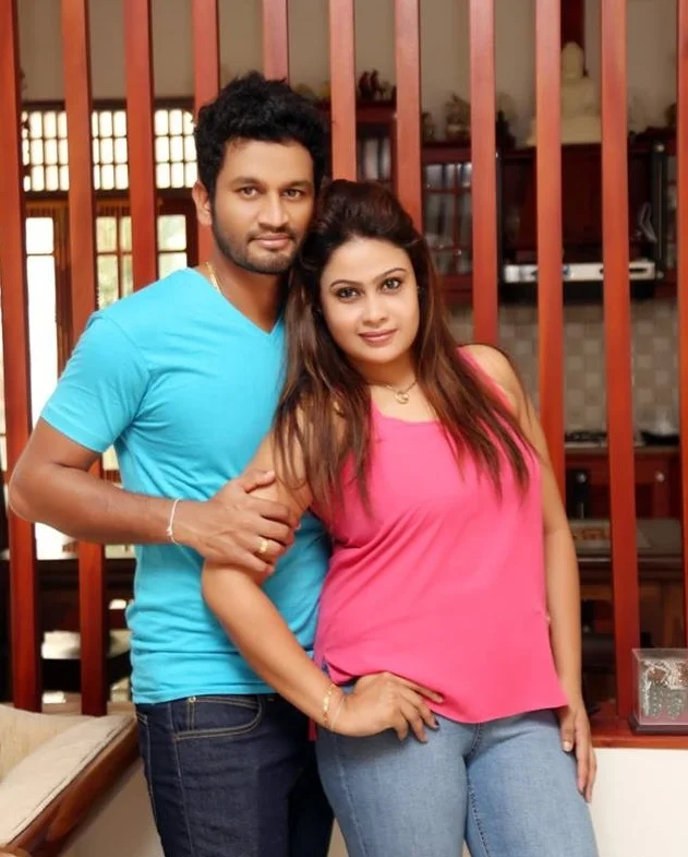 Dimuth Karunaratne and Anuradha Kurukulasooriya