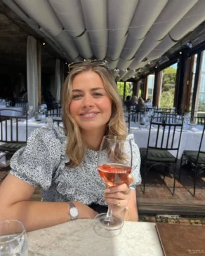 Ella Gurdon having wine